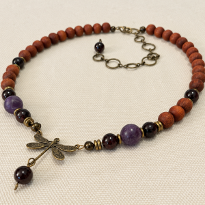 Choker necklace of a bronze dragonfly, and amethyst, garnet and brown wooden bayong beads